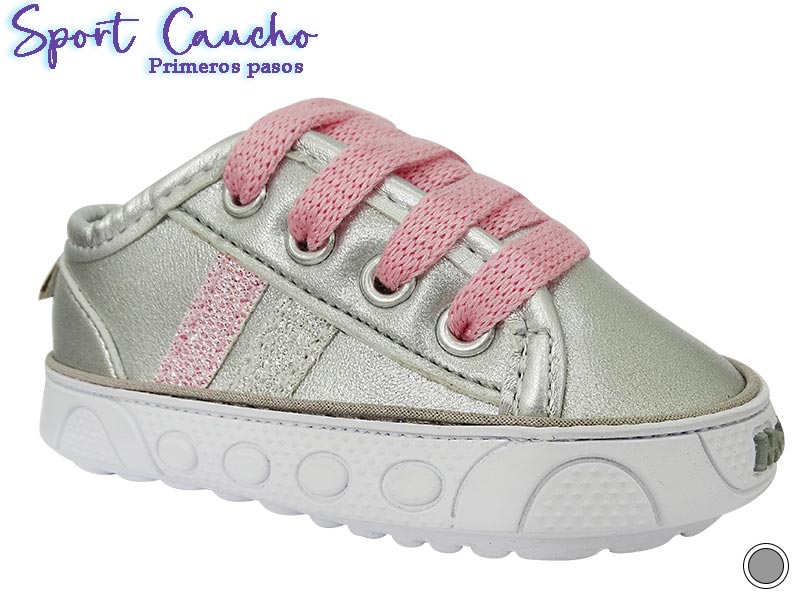 Zapatilla color plata con cordones rosados sport caucho